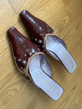 Prada Burgundy Patent Leather Star-Cutpoint Mules with Tan Trim